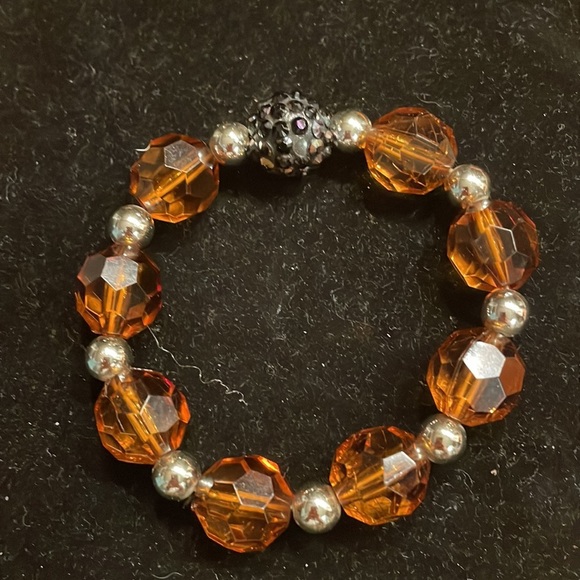 8” stackable stretch bracelet with 8 amber color & 9 silver tone beads - Picture 2 of 13